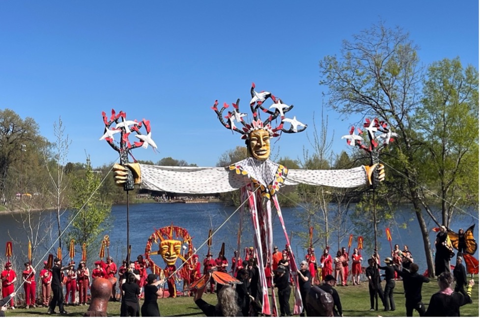 Picture of the large Tree of Life puppet with its arms outstreched